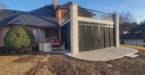 Panoramic covered patio security screen enclosure installed in Texas by Security Screen Masters of Texas