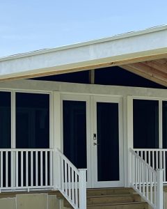 White Powder-Coated French Security Screen Doors on Texas Porch by Security Screen Masters of Texas