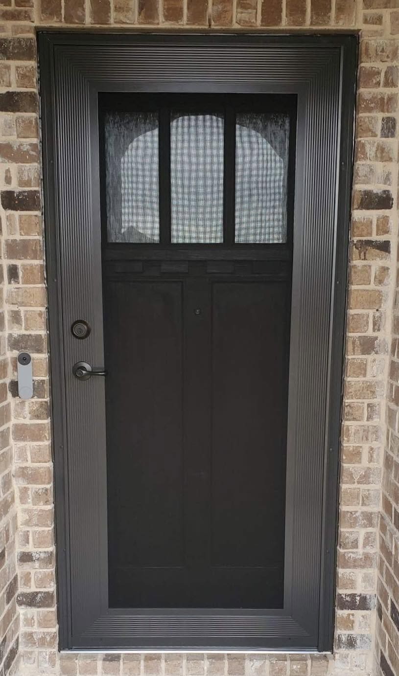 Craftsman style bronze security screen entry door installed in Fort Worth TX by Security Screen Masters of Texas