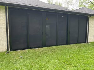 Screened porch security enclosure installed in Colleyville TX by Security Screen Masters of Texas