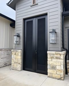 Tall black double French security screen doors on modern exterior by Security Screen Masters of Texas