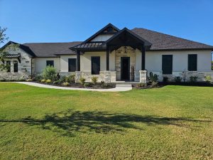 Architectural security window screens installed across full facade of luxury Texas home by Security Screen Masters of Texas